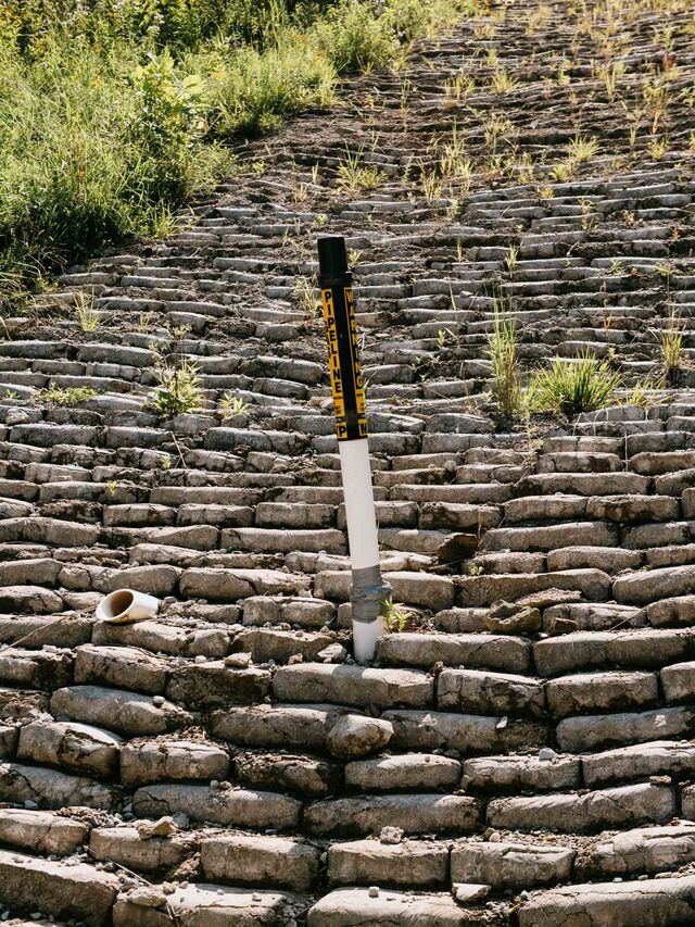 Mobley, WV (Wetzel County) - A finished section of the pipeline just south of where the pipeline originates. Here the slope had been stabilized by using bags of concrete.