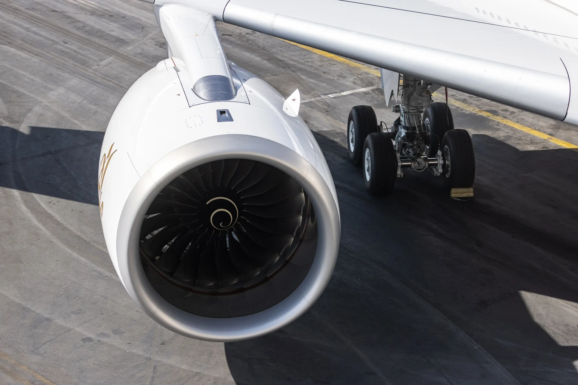 A Rolls Royce Trent XWB jet engine on an Emirates A350-900 passenger aircraft.