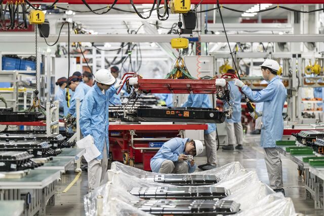 Workers on the battery pack manufacturing line at the Zhejiang Leapmotor Technology Co. production facility in Jinhua, China, in June.