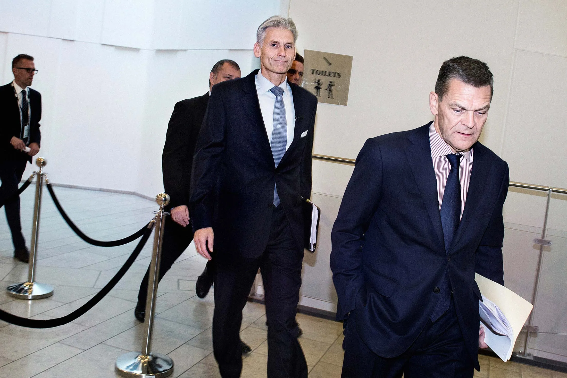 Danske Bank CEO Thomas Borgen and Chairman Ole Andersen arrive at a Sept. 19 press conference in Copenhagen to address the bank’s money laundering scandal.&nbsp;