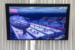 A screen shows an augmented reality application at the SenseTime Group headquarters in Shanghai.