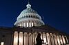 A pedestrian walks past the U.S. Capitol in Washington, D.C., U.S., on Wednesday, Dec. 18, 2019. The full House is set to debate and vote Wednesday on two impeachment articles accusing President Donald Trump of abusing his power and obstructing Congress's investigation of his actions toward Ukraine.