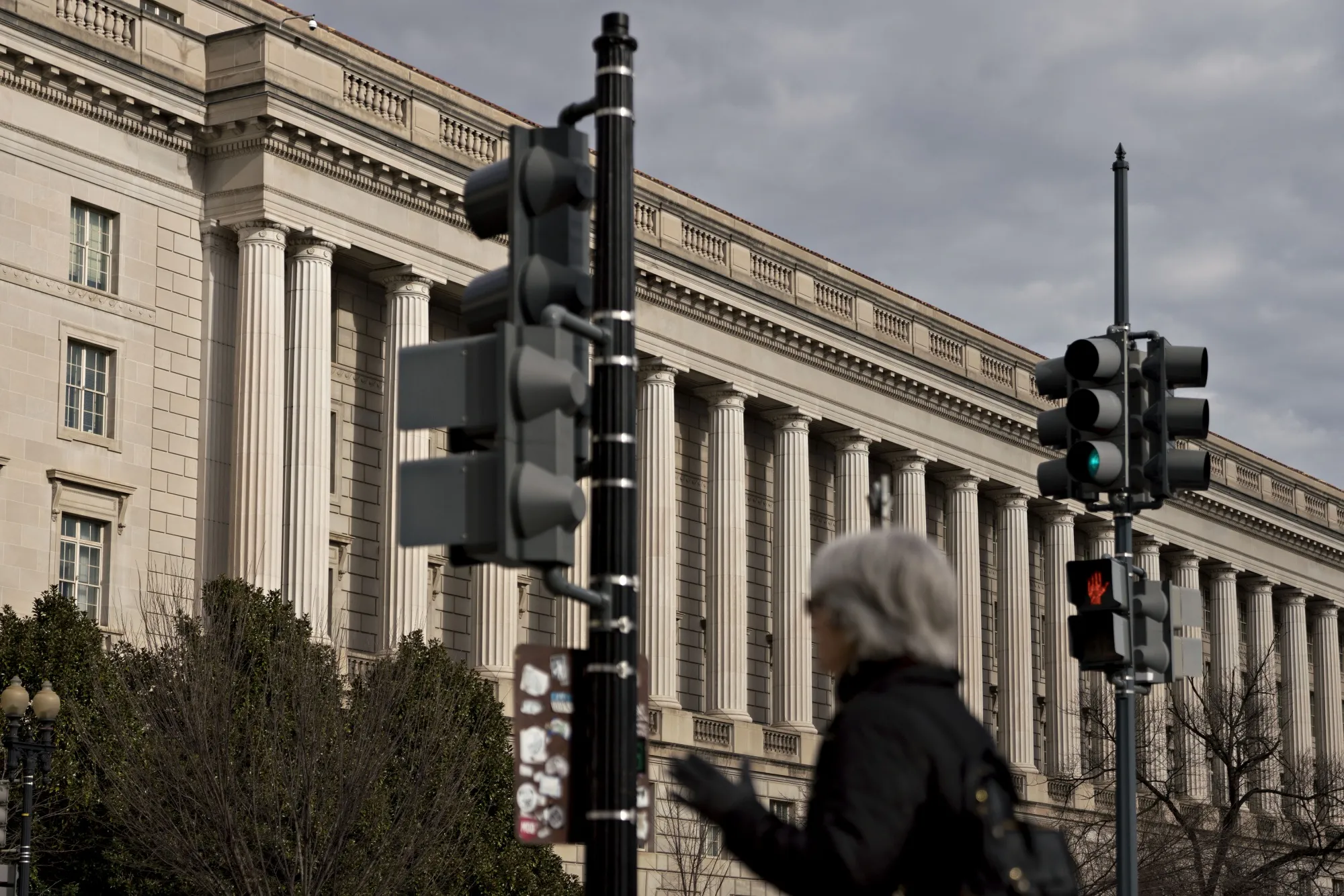 A pedestrian walks past the IRS&nbsp;headquarters in Washington, D.C.
