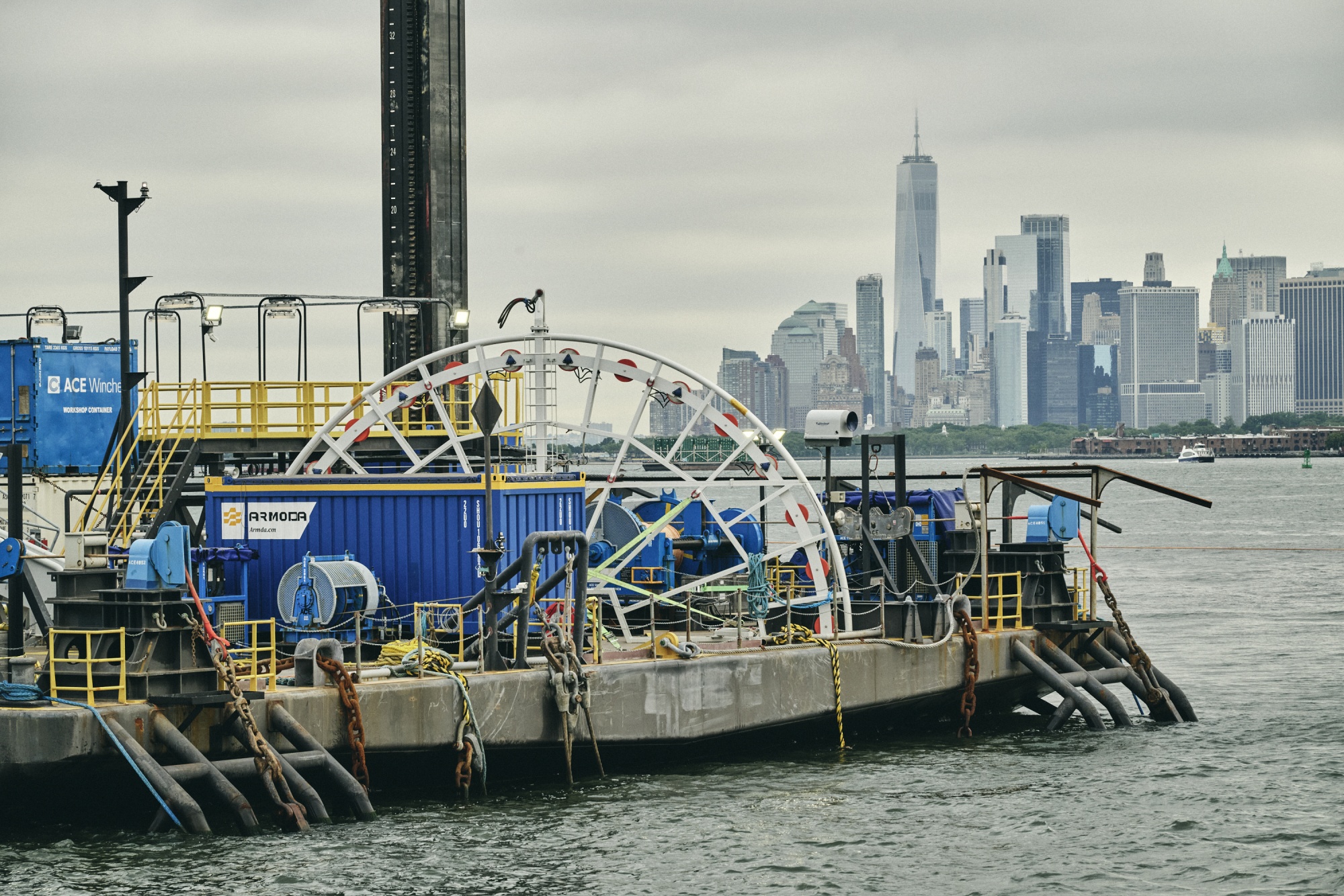 The Marmac 306, a cable laying barge, in the New York Harbor in New York, US, on Thursday, July 17, 2025. The crew of an American-flagged barge will lay cable to connect the Empire Wind farm to New York City’s grid — a milestone for an embattled sector. Photographer: Bryan Derballa/Bloomberg
