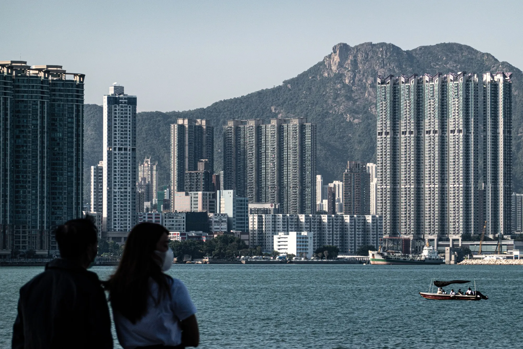 Residential buildings by the Victoria harborfront in the Kowloon area in Hong Kong.