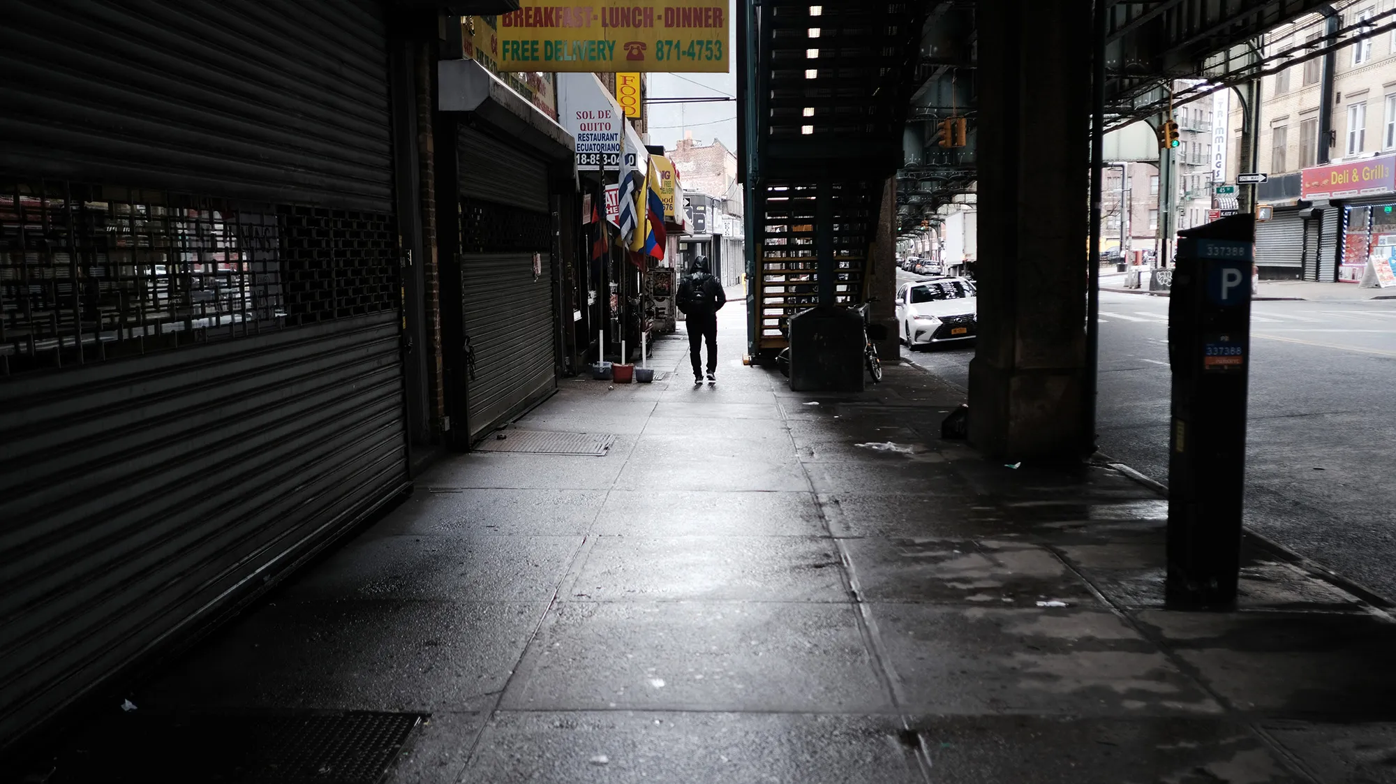People walk through the empty streets of the Borough Park neighborhood of Brooklyn on March 19.