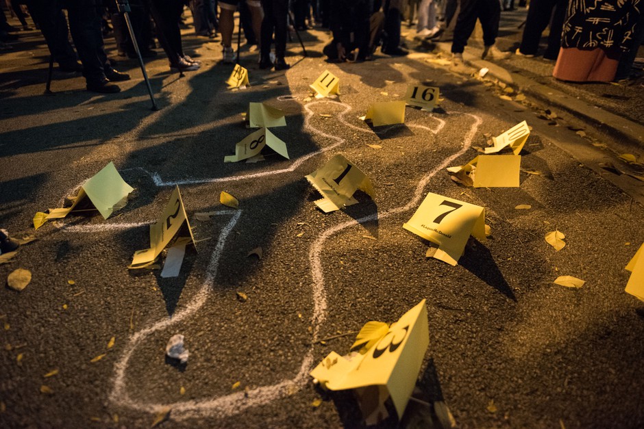 Protesters recreate the chalk body outline from the crime scene of the police shooting of 17-year-old Laquan McDonald. Chicago police officer Jason Van Dyke was convicted of murder for McDonald's death.