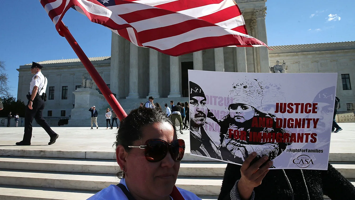 Pro-immigration protesters rally in front of the U.S. Supreme Court on March 18, 2016, in Washington.

