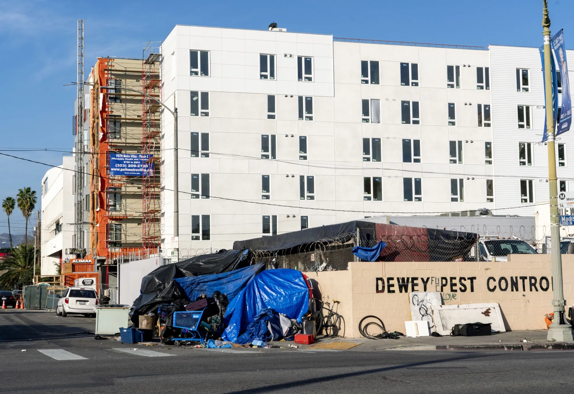 Tents near affordable housing units under construction in Los Angeles in 2020.