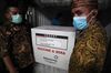 Workers unload the Sinovac Biotech Ltd. coronavirus vaccine in Jakarta, Indonesia, Jan. 7.