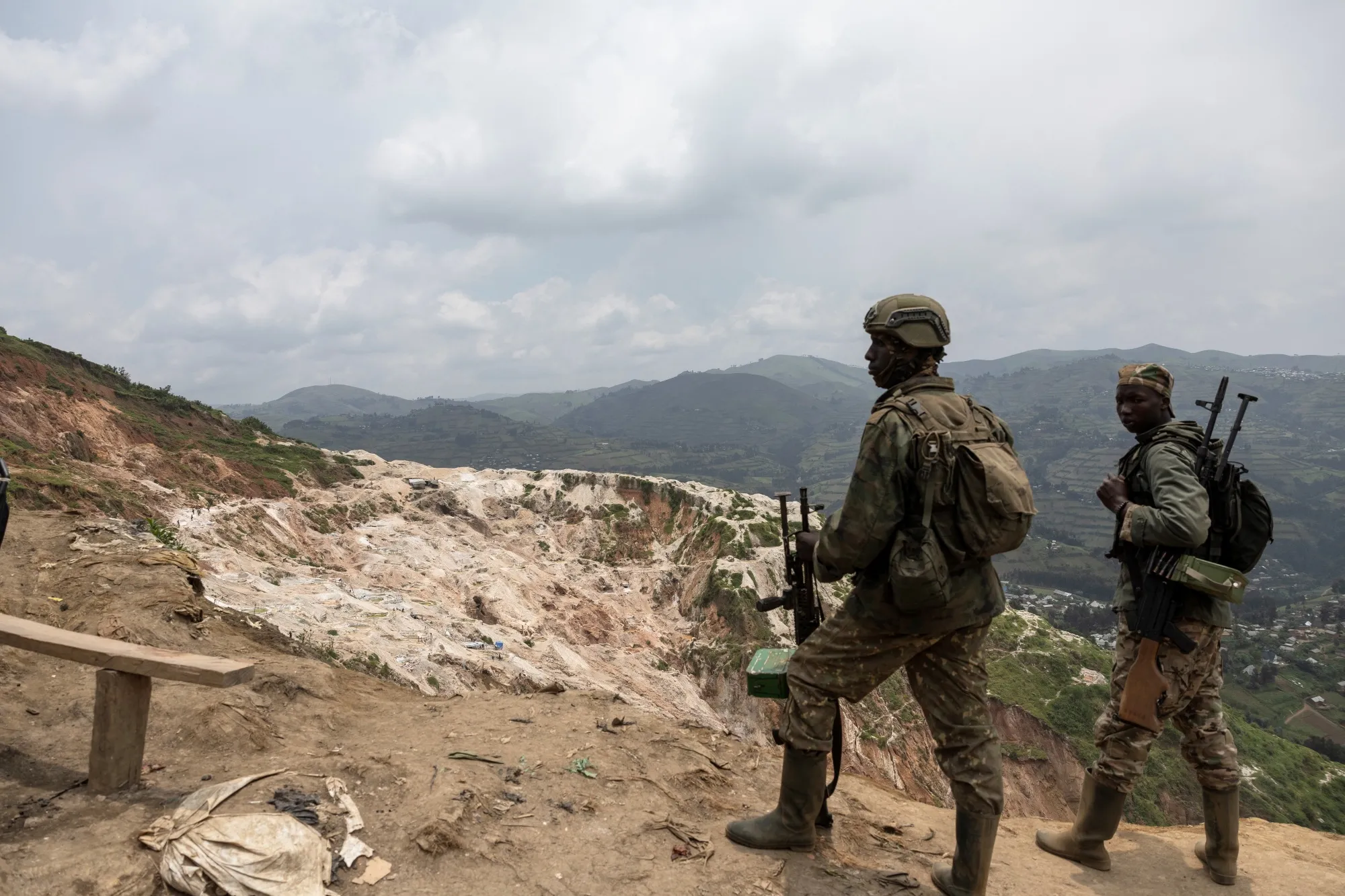 M23 soldiers stand at mining pits in Rubaya,&nbsp;Democratic Republic of the Congo in March, 2025.