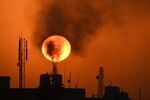 The sun sets over an oil refinery in the southern Iraqi town of Nasiriyah, Iraq.&nbsp;