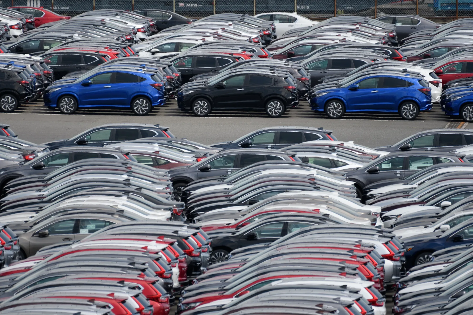 Vehicles bound for shipment at a port in Yokohama, Japan.