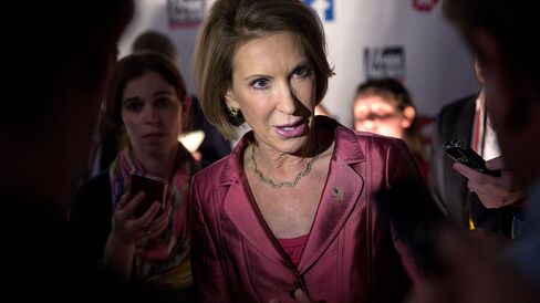 Carly Fiorina, former chairman and chief executive officer of Hewlett-Packard Co. and 2016 Republican presidential candidate, speaks to the media in the spin area after a televised forum ahead of the first Republican presidential debate in Cleveland, Ohio, on Aug. 6, 2015.