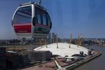 An Emirates Air Line gondola car crossing over the River Thames.