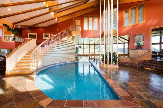 The Mansion That Chunky Monkey Built Has a Pool in the Foyer