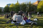 Groups of people sit in a park at Tantolunden in Stockholm, Sweden, on&nbsp;May 22.