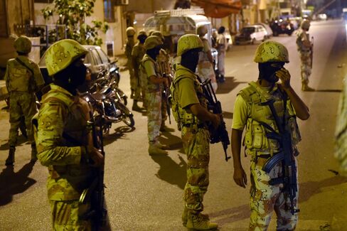 Pakistani paramilitary rangers raid the Muttahida Qaumi Movement party headquarters on Karachi on Aug. 22.