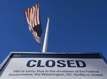 A sign is displayed on a building that is closed because of a US government shutdown in Washington, DC.