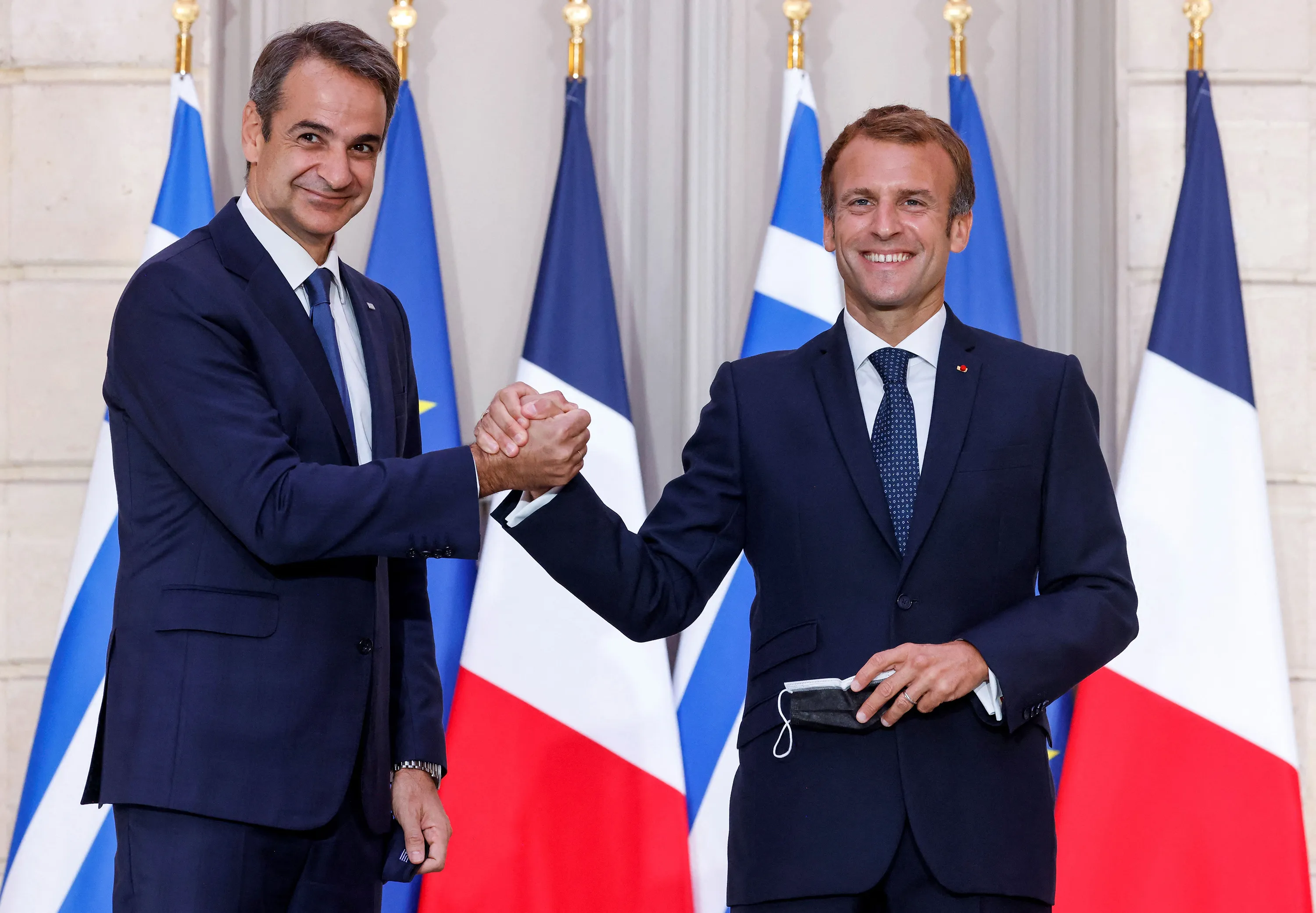 Macron Back With Greek Defense Pact After Submarine Crisis - Bloomberg
