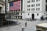 A pedestrian walks past the New York Stock Exchange&nbsp;on a nearly empty Wall Street in New York&nbsp;on March 30.&nbsp;