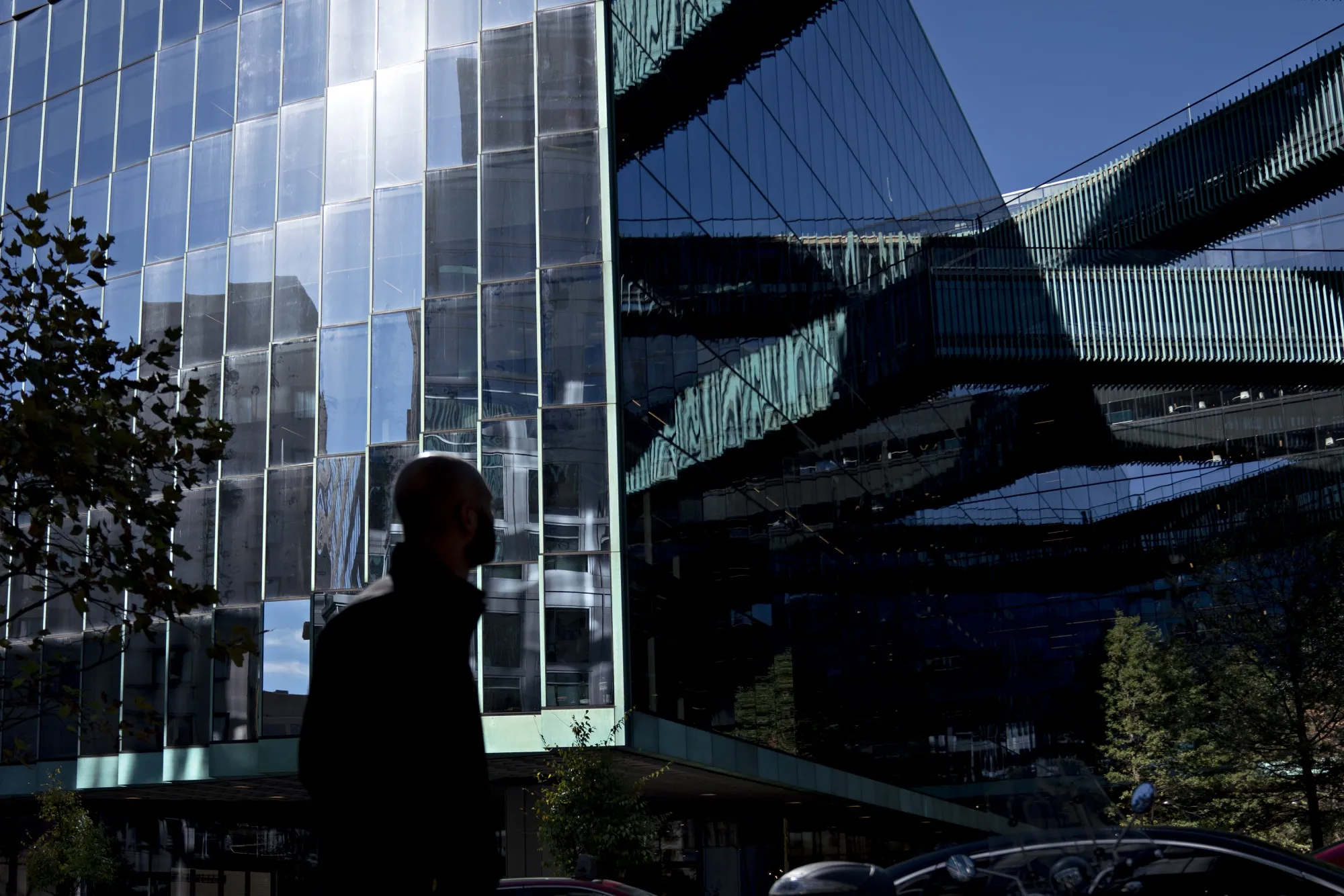 A pedestrian walks past Fannie Mae&nbsp;headquarters in Washington, D.C.