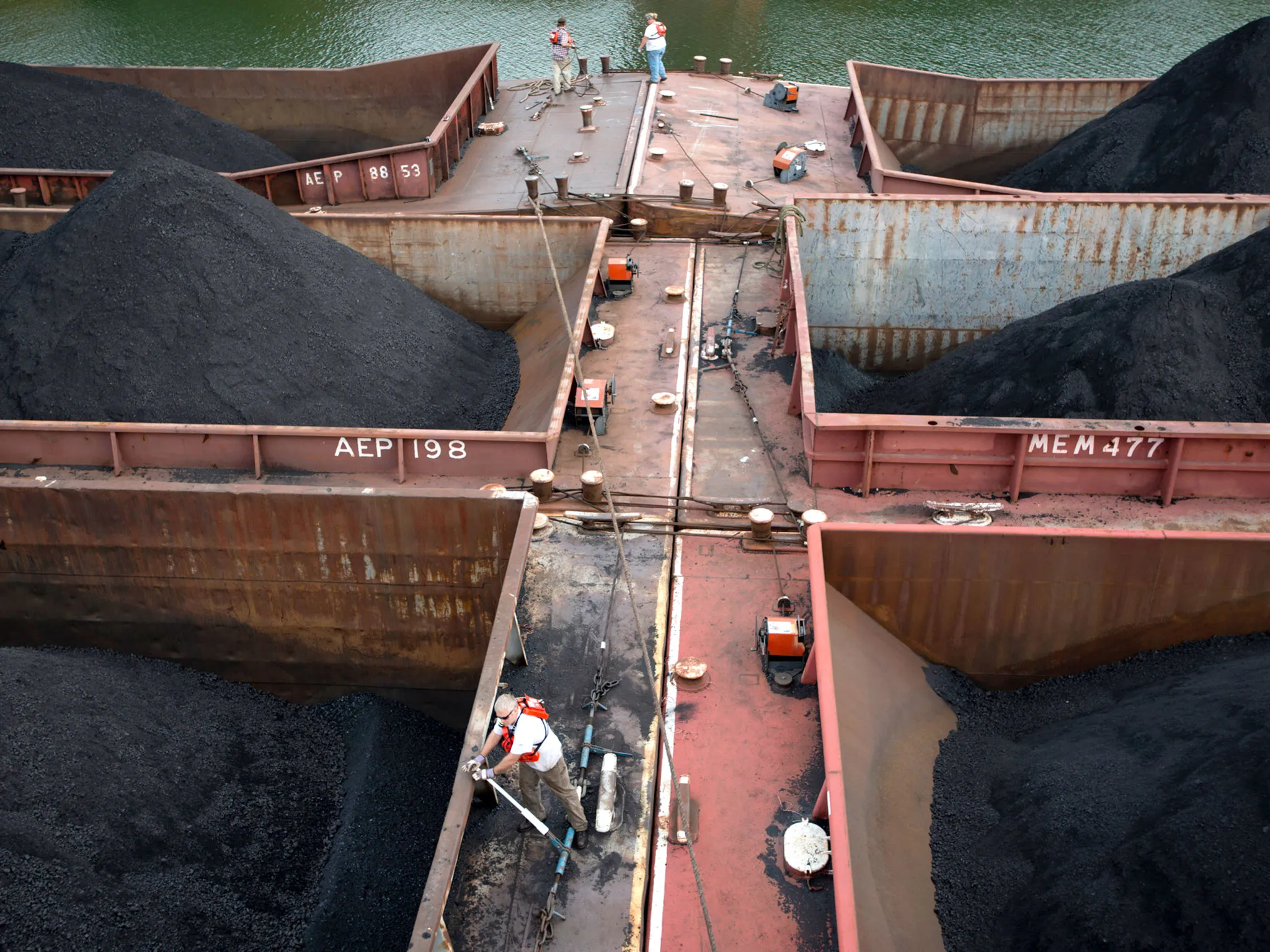 Fifteen barges together holding 30,000 tons of coal before making their way down the Ohio River in West Virginia, on Oct. 23, 2012.
