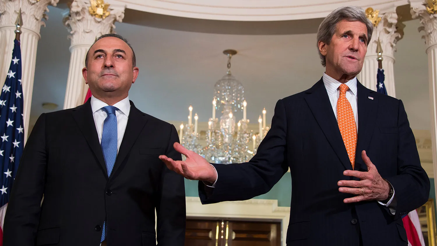 U.S. Secretary of State John Kerry and Turkish Foreign Minister Mevlut Cavusoglu speak at the State Department in Washington on March 28, 2016.
