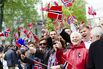 Celebrating Norway’s Constitution Day in Bergen, Norway, where many adults and children don traditional dress&nbsp;and wave&nbsp;flags at the passing procession, on May 17, 2017.