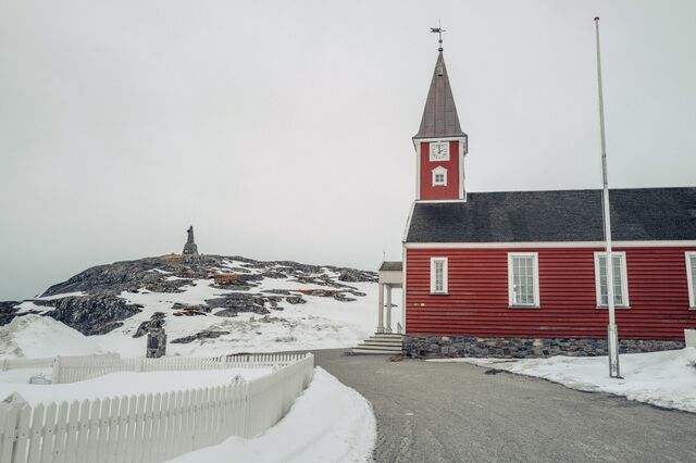 The statue of Hans Egede that commemorates the Dano-Norwegian Lutheran missionary who founded Nuuk in 1728, and the cathedral in the historical area of the city.