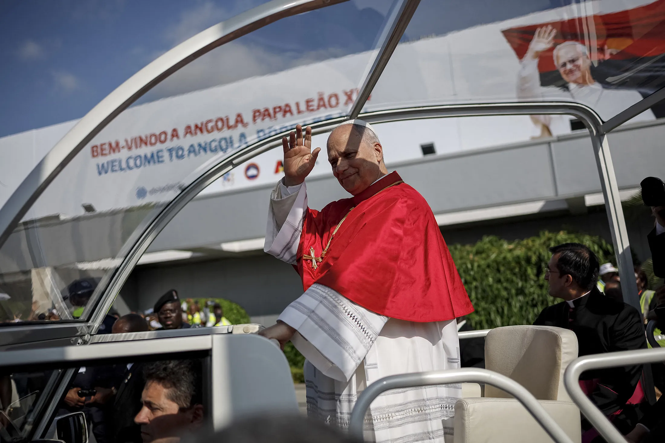 Pope Leo XIV&nbsp;waves from the Popemobile after arriving at the&nbsp;Luanda International Airport in Luanda, Angola,&nbsp;on April 18.