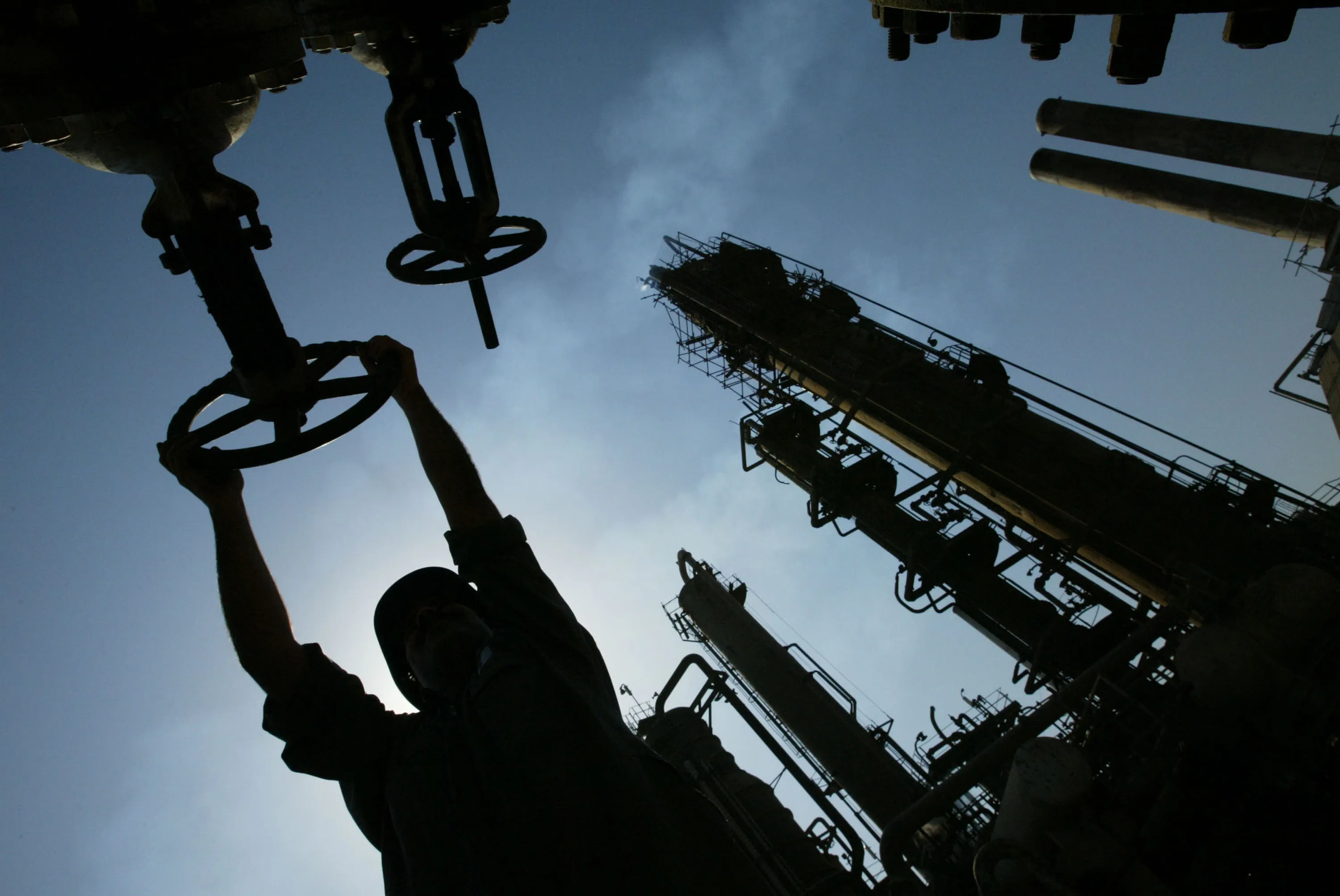 An Iraqi oil worker works at Al-Doura oil refinery in Baghdad, Iraq.