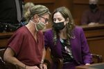 Shannon Smith, right, speaks with Jennifer Crumbley&nbsp;in court in Rochester Hills, Michigan, on Dec. 14.