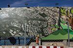 A banner advertises plans for a greener and more sustainable city.
