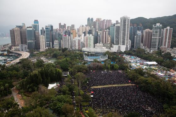 Protesters Block Roads After Police Halt Rally: Hong Kong Update