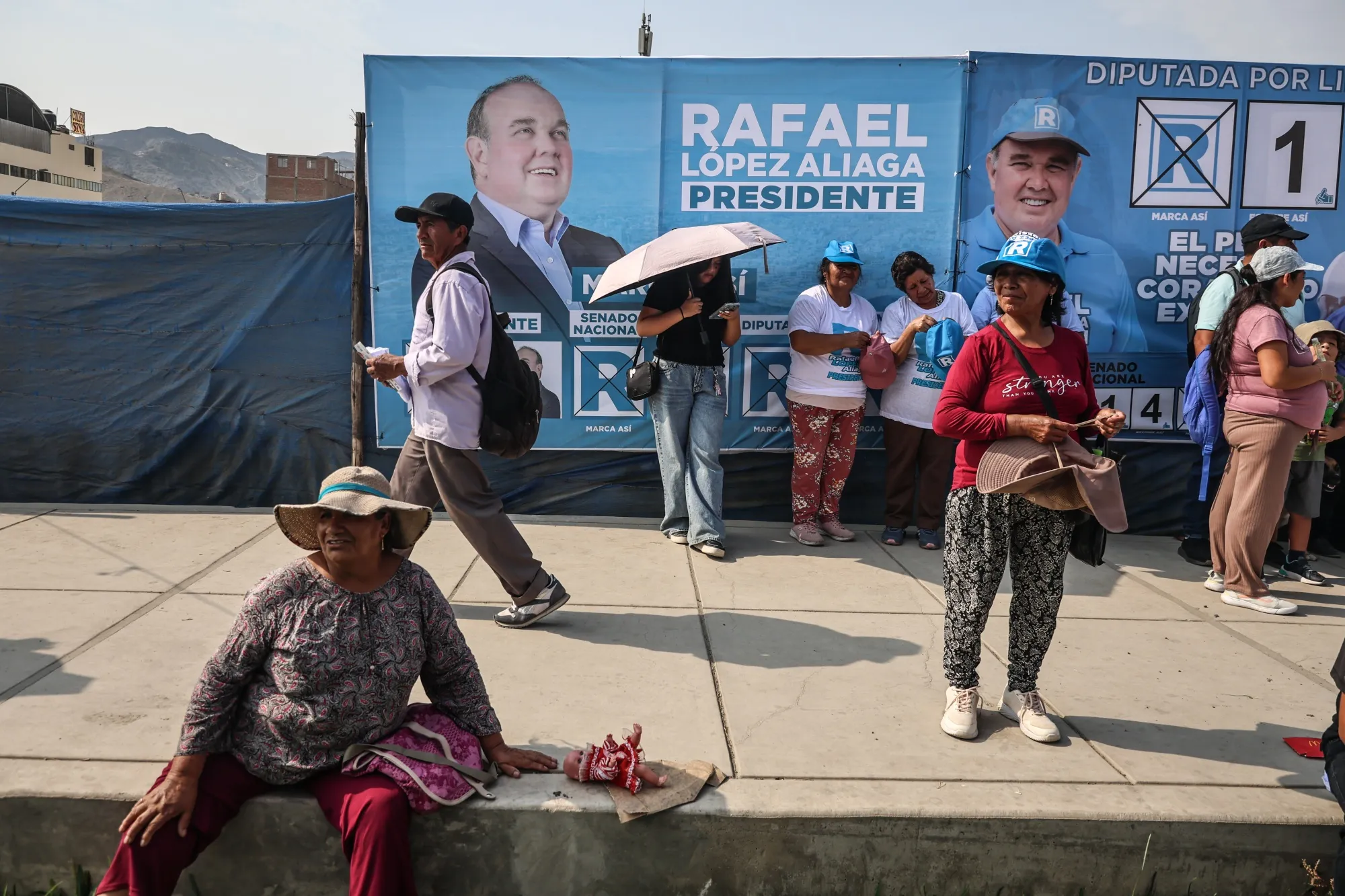 Supporters of Rafael López Aliaga at a campaign rally in the Manchay district of Lima.