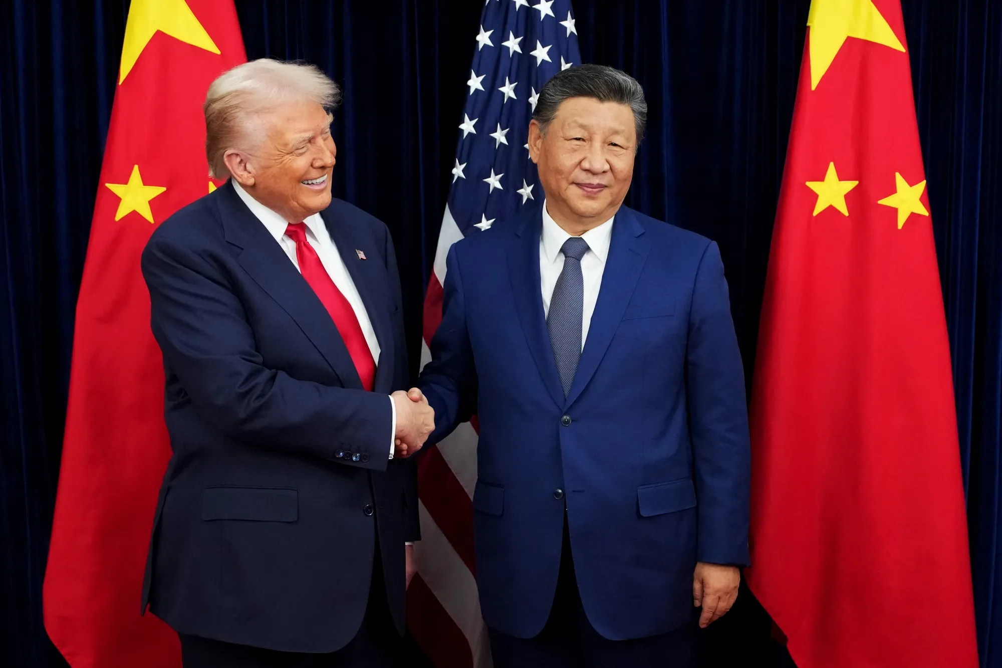 US President Donald Trump greets Chinese leader Xi Jinping in South Korea last October.&nbsp;