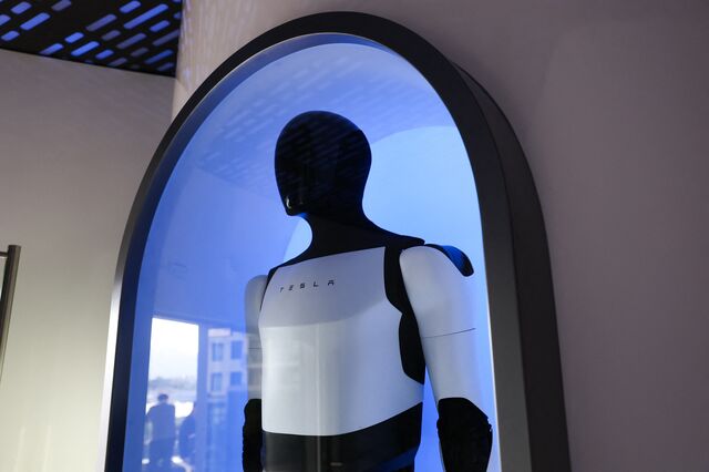 A Tesla Optimus robot during the opening of the Tesla Diner and Drive-In restaurant in Los Angeles on July 21, 2025. 