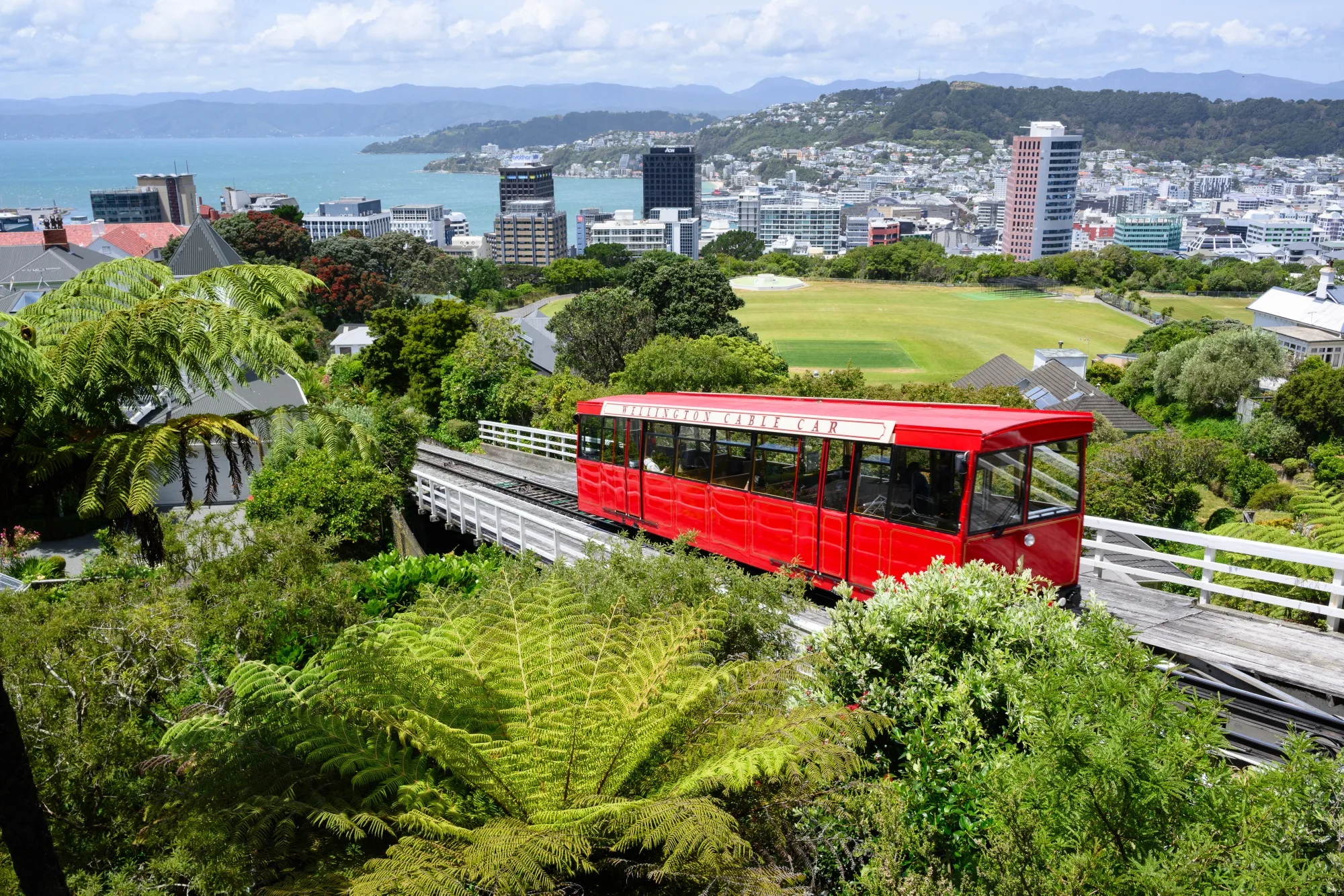 A cable car travels above the central business district in Wellington, New Zealand.