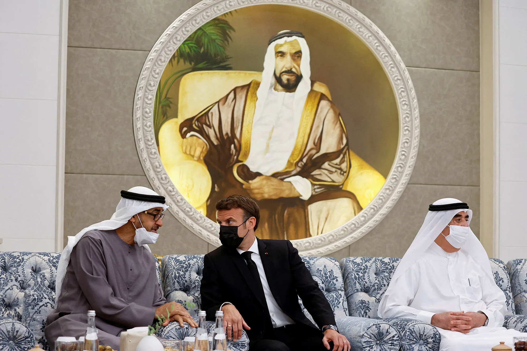 Emmanuel Macron, center, meets newly-elected Sheikh Mohammed bin Zayed Al Nahyan, left,&nbsp;in Abu Dhabi, on May 15.&nbsp;