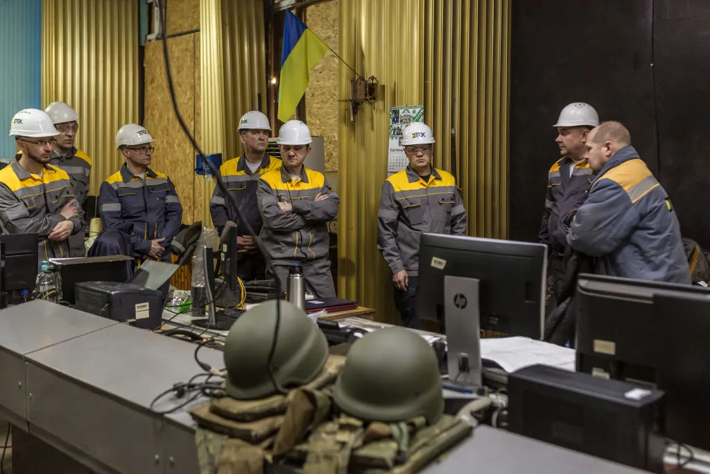 Staff check damage caused by a Russian missile attack at an energy plant in an undisclosed location in Ukraine, on April 2.