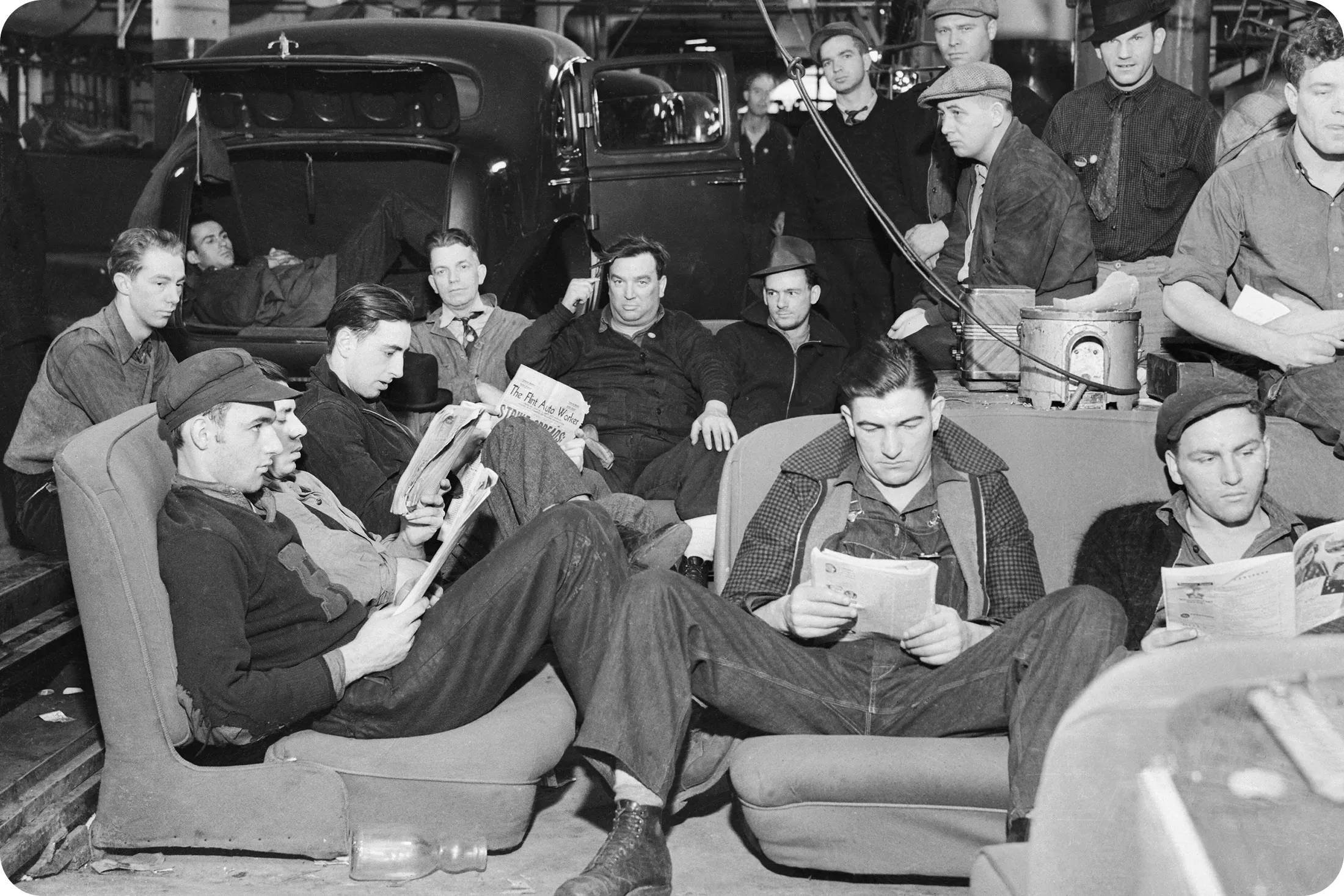 United Auto Workers stage&nbsp;the first successful sit-down strike at the General Motors factory in Flint, Michigan, beginning in December 1936.
