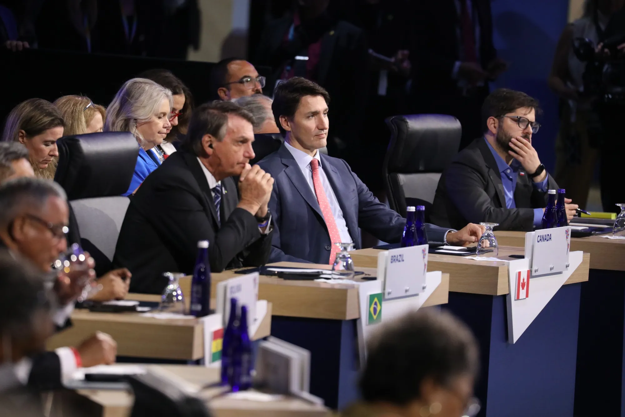 Justin Trudeau, middle, listens during the opening plenary session of the Summit of the Americas in Los Angeles on June 9.