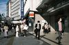 Tokyo cases hit record high as city plans to raise virus alert