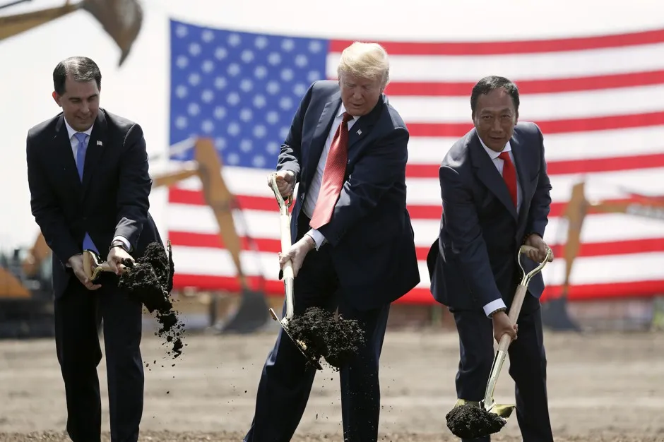 Then-Wisconsin Governor Scott Walker, President Donald Trump, and Foxconn founder and board member Terry Gou participate in a groundbreaking event for the new Foxconn facility in Mt. Pleasant, Wisconsin, in June 2018. Wisconsin offered Foxconn more than $4 billion in incentives.