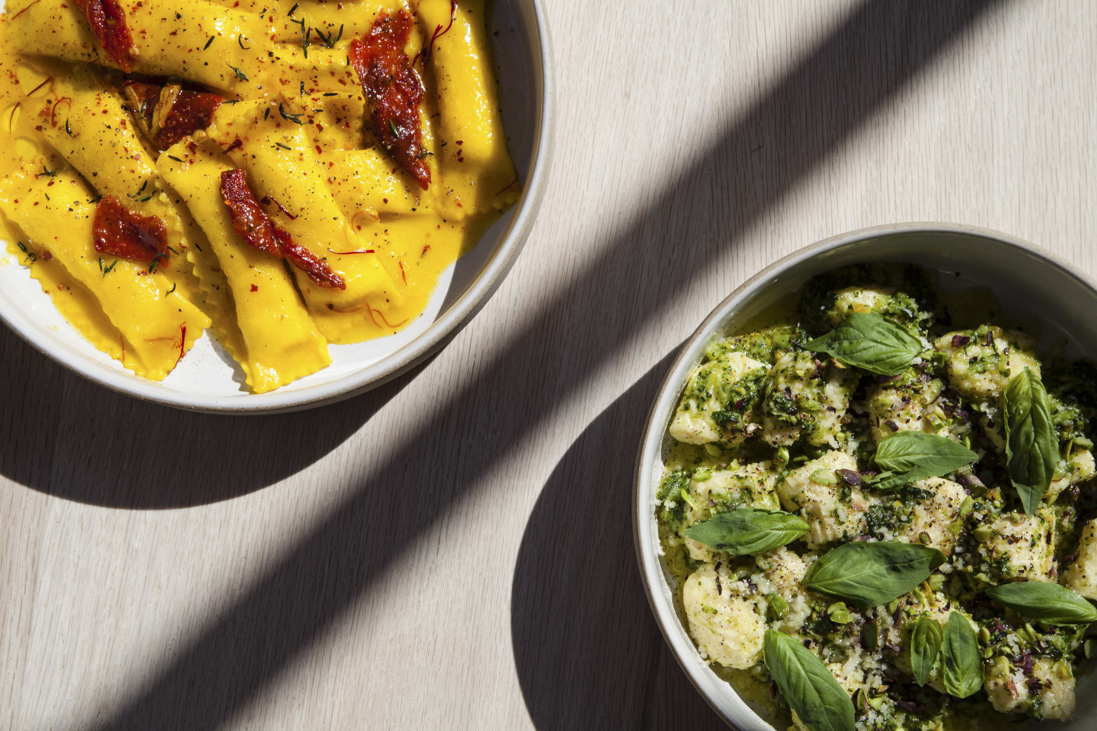 Lilia serves house-made pastas such as&nbsp;sheep's milk cheese agnolotti in saffron butter and ricotta gnocchi in a broccoli.