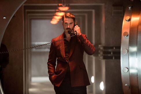 Alexander's business look: a custom suit in maroon Bateman Ogden wool with a matching Alumo cotton shirt.