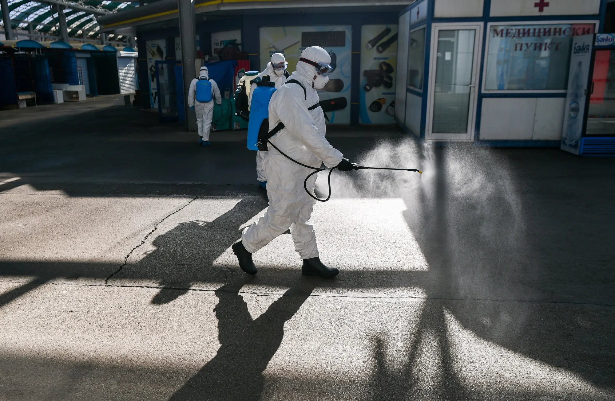Health official disinfect&nbsp;a market in Sofia on March 12.