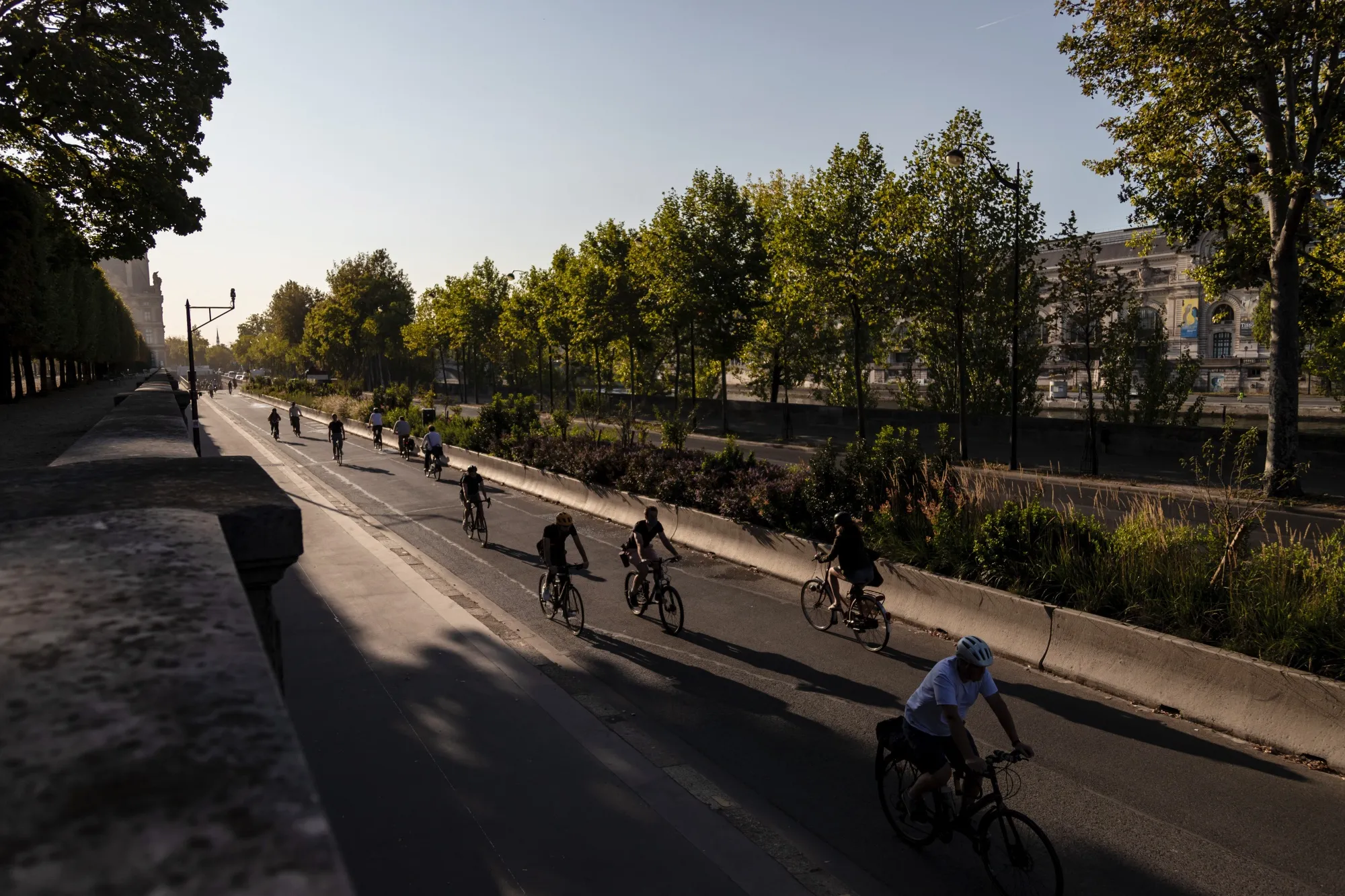 Cyclists use a two-lane bike lane on Voie Georges-Pompidou in Paris&nbsp;in 2020. The rapid expansion of car-free infrastructure has helped France improve its safety record as well as save gas.&nbsp;