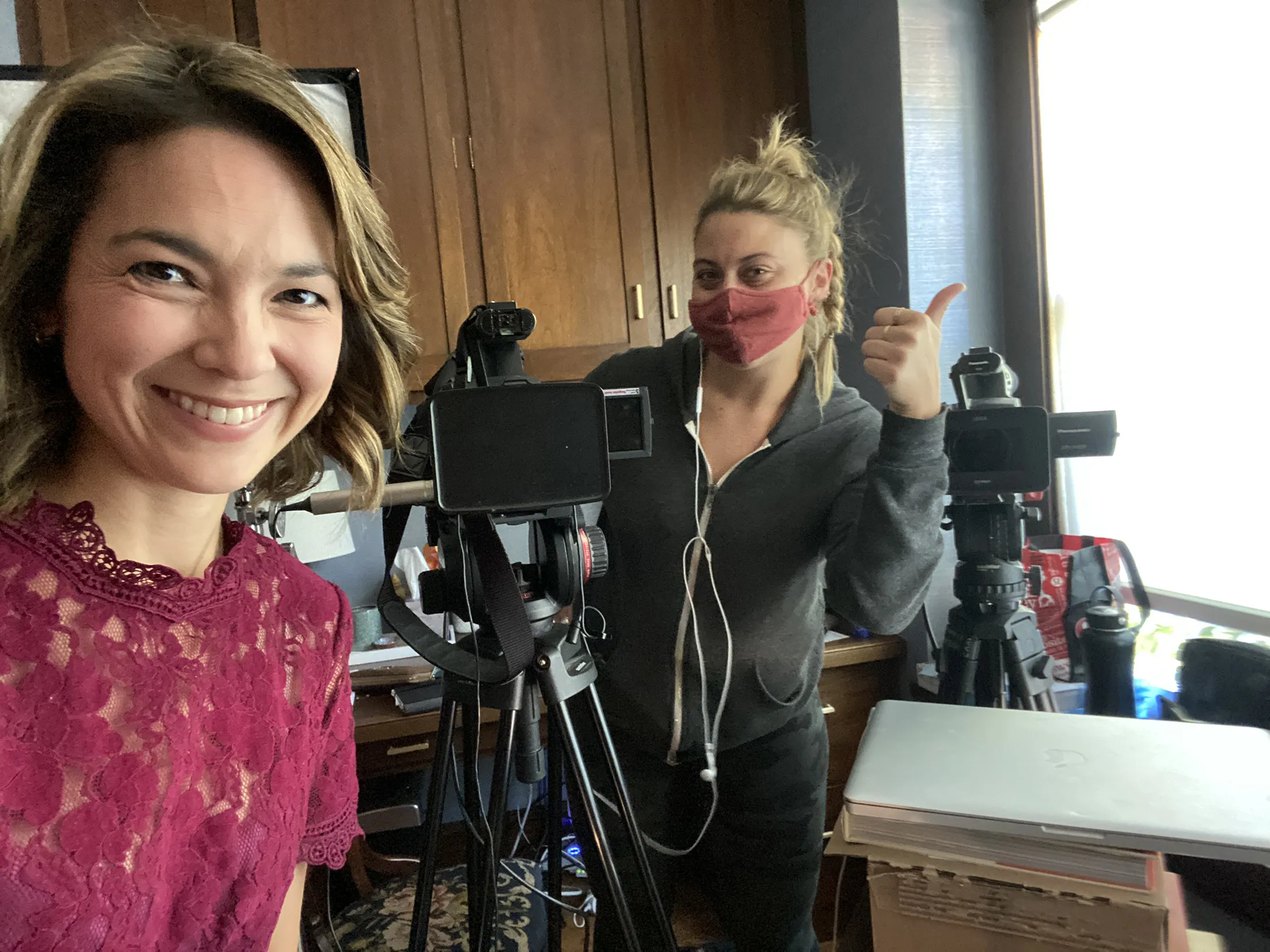 Emily Chang, left, with Bloomberg Technology studio producer Mallory Abelhouzen.